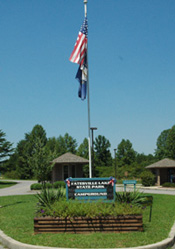 Yatesville Lake Campground Welcome Sign and United States Flagpole at Yatesville Lake State Park in Lawrence County, Kentucky.